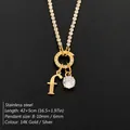 Elegant 14K gold plated stainless steel letter F pendant necklace with crystal details - Letter F