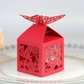 Red laser-cut butterfly favor box for candy with intricate floral patterns and 3D detail - Red