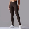 Detail of high-waist yoga leggings featuring a seamless cross V-waistband in dark brown - Dark Coffee