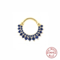 Macro shot of 925 sterling silver gold nose ring with double rows of blue rhinestones - Gold-Blue Zirconia