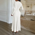 Elegant white long sleeve maxi dress in textured knit fabric shown from back view - S / White
