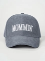 Detailed view of the MOMMIN' embroidered text on a dark grey corduroy baseball cap - Adjustable / Gray