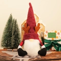 Gnome de Noël scandinave avec bois de renne et manches à carreaux pour déco festive - Gnome à Chapeau de Bois de Renne