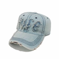 Detailed view of frayed edges and 'Wife' embroidery on a vintage washed denim baseball cap - M (56-58cm) / Blue Beige