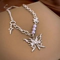 Silver Y2K lava butterfly necklace with purple beads and rhinestones on a silk background - Silver Purple