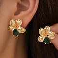 Golden flower earrings with a green teardrop gemstone pendant for elegant women - Gold Flower Studs with Green Waterdrop Gem