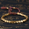 Hand-woven adjustable bracelet featuring matte golden flat beads and colorful cord. - Colorful Rope Metal Bead Braided Style