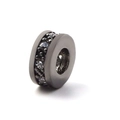 Macro detail of copper spacer bead with micro-pave cubic zirconia in dark gray finish - White Zircon (Gun Black)