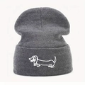 Dark grey ribbed knit beanie featuring a minimalist white embroidered dachshund design - One Size / Gray
