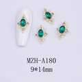 Close-up of vintage emerald green rhombus nail jewelry with gold alloy and white zircons - Gold Base Green Stone(A180)