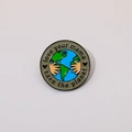 Detail of enamel pin showing hands holding the Earth with Save the Planet engraving - Love Your Mama Save The Planet Earth (C2260)