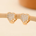 Macro shot of gold-plated heart hoop earrings with micro-paved white zircons on a twig - EH233 Heart Pave Design