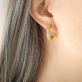 Elegant gold-plated C-shaped huggie earrings featuring micro-pave cubic zirconia inlay - Gold