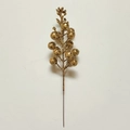 Close-up of a decorative gold glitter berry branch for festive Christmas tree DIY crafts - Champagne Gold