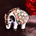 Detailed view of elephant keychain with white enamel and colorful cat-eye stones - Single OPP Bag Packaging / Multi-Color Cat Eye Elephant