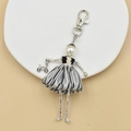 Handmade doll keychain with pearl head, striped skirt and silver bicycle pendant charm - 26-Black White Vertical Stripe Doll