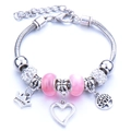 Silver bead bracelet with pink gems, princess crown pendant, and heart charms - Pink