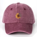 Washed cotton baseball cap in burgundy with sunflower and butterfly embroidery detail - Burgundy