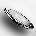 Polished silver metal phone ring holder with a circular white striped pattern design - Patterned Silver