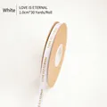 White 1cm grosgrain ribbon roll with gold foil Love Is Eternal text for flower bouquets - 1.0cm Wide x 30 Yards Long / White