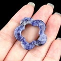 Handheld 30mm hollow plum blossom pendant in mottled blue and white natural sodalite stone - Blue Sodalite