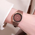 Close-up of Modaiya women's watch with brown silicone strap and rose gold date display - Coffee