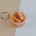 Miniature beef noodle keychain in clear bucket with realistic soup and toppings - Squid Corn Noodle