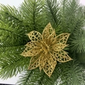 Decorazione floreale natalizia cava oro scintillante su rami di pino verde - Oro