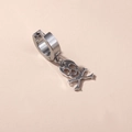 Minimalist punk stainless steel huggie hoop earring with silver skull and crossbones charm - Polished Skull