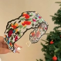 Detailed close-up of white mesh headband with colorful floral embroidery on a wide band - Black-Green Embroidered Headband Spring-Summer
