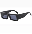 Macro detail of glossy black rectangle sunglasses frame with silver triple rivet studs - Bright Black