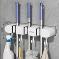 White wall-mounted suction mop holder with 3 rollers and 4 hooks, size 26x8.8cm - 3 Clips 4 Hooks Ivory White