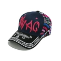 Close-up of SWAG 3D embroidery and graffiti skull patterns on a baseball cap - Navy and Pink (B)