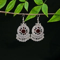 Detailed close-up of ethnic silver earrings with colorful beads and metal tassels on branch - Silver Red Green Accessory Tassel(E4975-2)