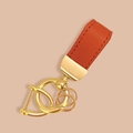 Cute orange leather keychain with premium gold-tone metal D-ring and swivel lobster clasp - Plain Orange Leather