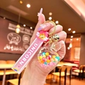 Unicorn keychain with pink star wand, colorful heart charm and golden bell pendant - Glow-in-the-dark Rainbow Candies [heart-shaped Perfume Bottle]