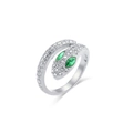 Macro shot of silver snake ring featuring green emerald eyes and sparkling clear zircon stones - Adjustable Open / Silver with Green Eye