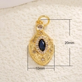 Macro detail of a 20x10mm gold moon pendant featuring a blue gem and zircon inlay - A0213-Gold Spindle Blue Gem