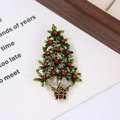 Detail of Christmas tree brooch with green enamel and red rhinestones on a card - Style 11 (6.5*3.9cm)