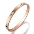 Elegante bracciale rigido in oro rosa con dettagli malocchio e accenti di diamante - MSXBXS106R / Oro rosa