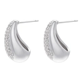 Macro shot of silver teardrop studs with pavé white zircons and mirror-polished inner surface - Platinum White Zirconia