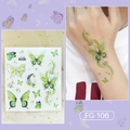 Green butterfly and moon glitter tattoo stickers FG-106 showing on hand and sheet - Green Butterfly Moon (FG-106)