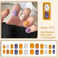 Detail of A594 floral press-on nails featuring purple and orange patterns in 24pcs set - Orange Purple Floral Short Square Style (A594)