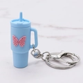 Light blue soft silicone cup keychain featuring a pink butterfly and silver metal ring - Blue Butterfly Cup Keychain