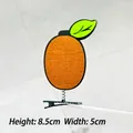 Funny orange fruit hair clip with spring and felt fabric, size 8.5cm high by 5cm wide - Kiwi Fruit Hair Clip