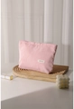 Pink corduroy makeup bag on wood tray with soft lighting for travel storage - Pink