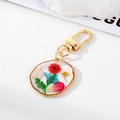 Handmade gold metal keychain with real dried flowers in a clear round resin pendant - 7# Red Flower with Green Leaves