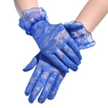 Detailed view of bright blue lace gloves with floral patterns and ruffled wrist cuffs - One Size / Bright Royal Blue