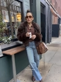 Brown faux fur jacket styled with blue jeans and sunglasses in an urban street setting - S / Coffee