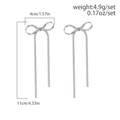 Silver bow stud earrings with long snake chain tassels and size measurement details - Snake Chain Bow Tassel Earrings / Silver